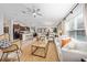 Open living room and kitchen area with comfortable seating and natural light at 4483 Casablanca Ave, Kissimmee, FL 34746