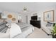 Spacious main bedroom with king-size bed, dresser and sitting chair at 4483 Casablanca Ave, Kissimmee, FL 34746