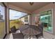 Screened patio with access to backyard and interior dining area at 4483 Casablanca Ave, Kissimmee, FL 34746