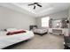 Spacious bedroom with two beds and a vanity at 4806 Tribute Trl, Kissimmee, FL 34746