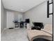 Home office with desk, chair, and chaise lounge at 4806 Tribute Trl, Kissimmee, FL 34746