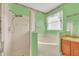 Bathroom with shower and corner bathtub at 4878 Zion Dr, St Cloud, FL 34772