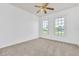 Bright bedroom featuring carpet and large windows at 4878 Zion Dr, St Cloud, FL 34772