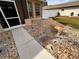 Front yard walkway with decorative stones and plants at 4878 Zion Dr, St Cloud, FL 34772