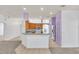 Kitchen features wood cabinets, granite counters, and stainless steel appliances at 4878 Zion Dr, St Cloud, FL 34772