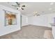 Bright living room with carpet flooring and large window at 4878 Zion Dr, St Cloud, FL 34772