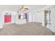 Open living area with view of kitchen and entryway at 4878 Zion Dr, St Cloud, FL 34772