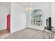 Living room features a large window and red door at 4878 Zion Dr, St Cloud, FL 34772