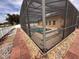 Relaxing screened-in pool area with surrounding landscaping at 4878 Zion Dr, St Cloud, FL 34772