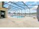 Enclosed pool area with screened patio and decking at 4878 Zion Dr, St Cloud, FL 34772
