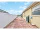 Brick paved side yard with fenced enclosure at 4878 Zion Dr, St Cloud, FL 34772