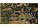 Wide aerial view highlighting property boundaries and buildings at 4999 Disston Dr, St Cloud, FL 34771