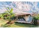 House with backyard, patio, and lush landscaping at 4999 Disston Dr, St Cloud, FL 34771