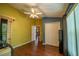 Bedroom with wood floors, double doors, and a sauna at 4999 Disston Dr, St Cloud, FL 34771
