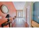 Bright entryway with hardwood floors and decorative accents at 4999 Disston Dr, St Cloud, FL 34771