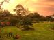 Landscaped garden with various plants at sunset at 4999 Disston Dr, St Cloud, FL 34771