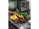 Fresh tropical fruits and vegetables on counter at 4999 Disston Dr, St Cloud, FL 34771