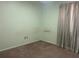 Simple bedroom with carpet and window curtains at 5319 Glasgow Ave, Orlando, FL 32819