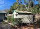 View of the back of a white storage shed at 5319 Glasgow Ave, Orlando, FL 32819