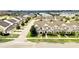 Townhome community with numerous houses and landscaping at 6530 Stoller Ave, Windermere, FL 34786