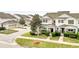 Townhome community view, showcasing a corner unit at 6530 Stoller Ave, Windermere, FL 34786