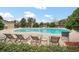 Relax by the community pool with lounge chairs at 6530 Stoller Ave, Windermere, FL 34786