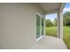 Covered patio with sliding glass door access at 661 Lincoln St, Kissimmee, FL 34741