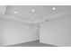 Bright bedroom with tile flooring and door at 661 Lincoln St, Kissimmee, FL 34741