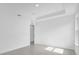 Well-lit bedroom with gray tile flooring at 661 Lincoln St, Kissimmee, FL 34741