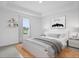 Cozy bedroom with window and stylish decor at 661 Lincoln St, Kissimmee, FL 34741