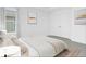 Bright bedroom with double doors and large window at 661 Lincoln St, Kissimmee, FL 34741
