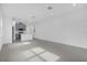 Open living room with kitchen view and access to backyard at 661 Lincoln St, Kissimmee, FL 34741