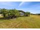 Spacious backyard with a large screened patio at 672 San Joaquin Rd, Kissimmee, FL 34759