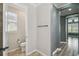Simple toilet and sink area in small bathroom at 672 San Joaquin Rd, Kissimmee, FL 34759