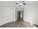 Bedroom with double doors leading to the entryway at 672 San Joaquin Rd, Kissimmee, FL 34759