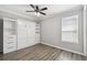 Bedroom with a built-in murphy bed and shelving at 672 San Joaquin Rd, Kissimmee, FL 34759