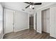Bright bedroom with wood flooring and ceiling fan at 672 San Joaquin Rd, Kissimmee, FL 34759