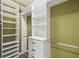Large closet with hanging rods and multiple shelves at 672 San Joaquin Rd, Kissimmee, FL 34759
