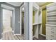 Spacious walk-in closets with built-in shelves and drawers at 672 San Joaquin Rd, Kissimmee, FL 34759