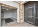 Attached garage with a storage rack and screen door at 672 San Joaquin Rd, Kissimmee, FL 34759