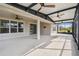 Spacious screened patio with ceiling fans, perfect for outdoor relaxation at 672 San Joaquin Rd, Kissimmee, FL 34759