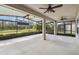 Large screened patio overlooks a beautiful backyard at 672 San Joaquin Rd, Kissimmee, FL 34759