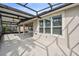 Extended screened patio with ceiling fan and window at 672 San Joaquin Rd, Kissimmee, FL 34759
