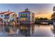 Luxury building on the water with bridge at sunset at 672 San Joaquin Rd, Kissimmee, FL 34759