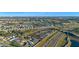 Aerial view showing a community near a highway and conservation area at 8077 Roaring Creek Ct, Kissimmee, FL 34747