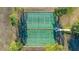 Aerial view of tennis and basketball courts at 8077 Roaring Creek Ct, Kissimmee, FL 34747