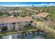 Community of condos near golf course with lake views at 8318 Quimby Cir, Davenport, FL 33896