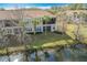 Back exterior view of condo with water access at 8318 Quimby Cir, Davenport, FL 33896
