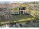 Aerial view of condo showcasing back exterior and waterfront at 8318 Quimby Cir, Davenport, FL 33896