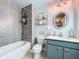 Bathroom with a bathtub, toilet and vanity at 8318 Quimby Cir, Davenport, FL 33896
